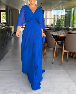 Jurk met plooien en ingesnoerde taille