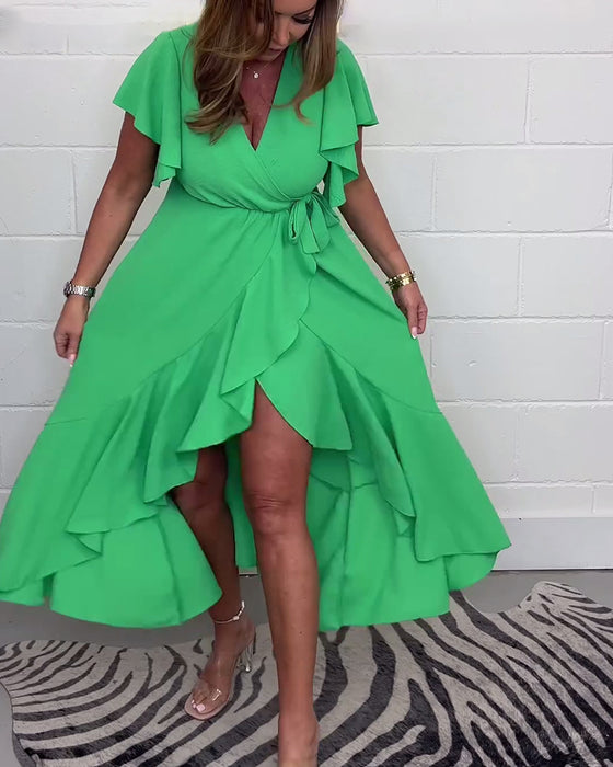 Elegante jurk met ruches, effen kleur en split