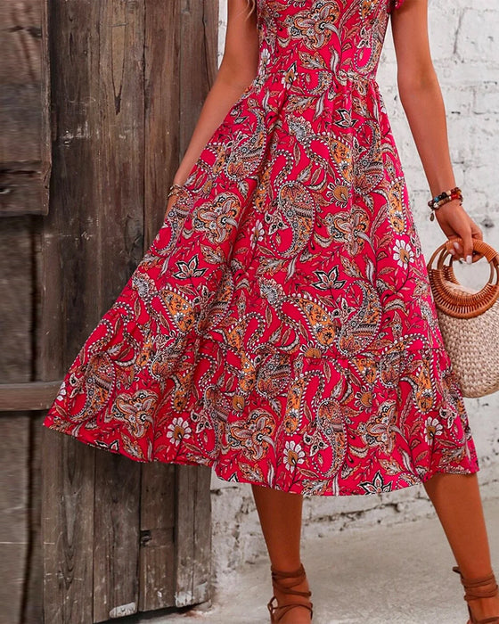 Jurk met korte mouwen en gebloemde V-hals