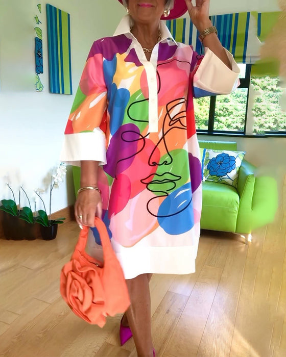 Jurk met reverskleurige portretprint