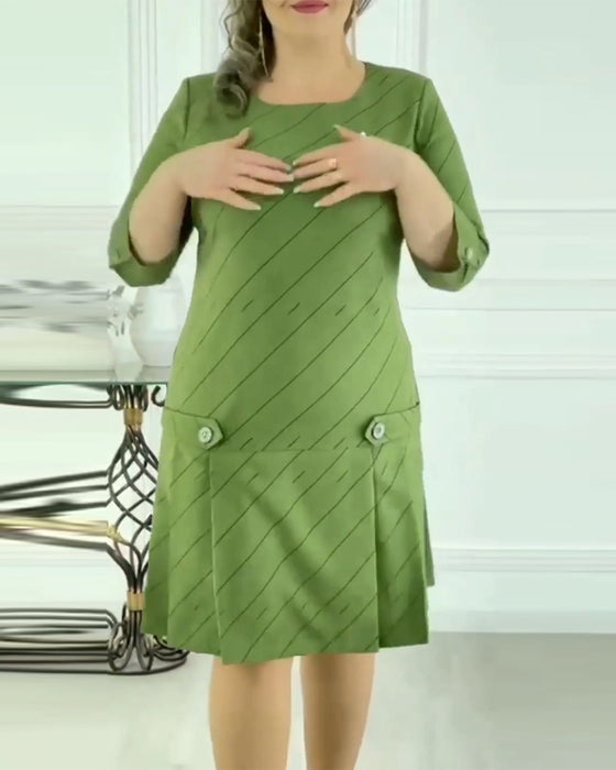 Elegante jurk met ronde hals en lijnprint