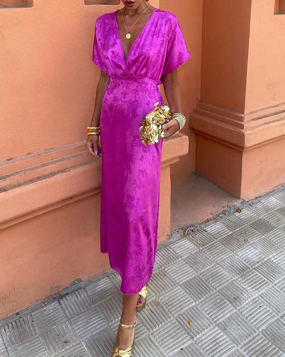 Elegante jurk met diepe V-taille, effen kleur