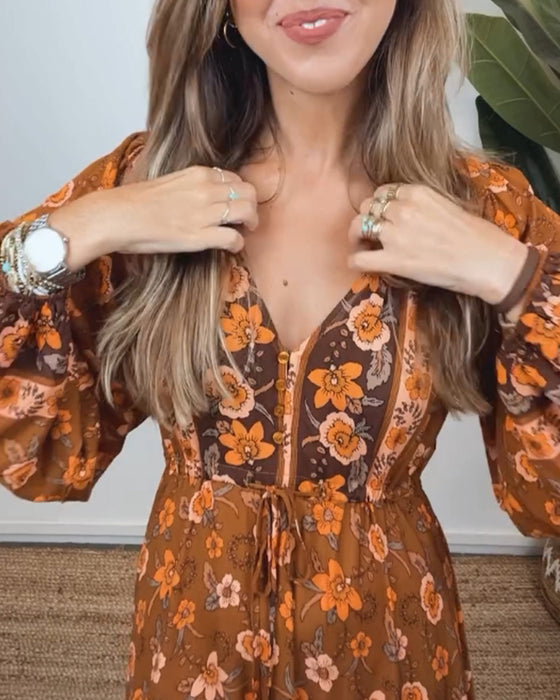 Vintage bloemenprint jurk met V-hals en lantaarnmouw