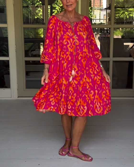 Jurk met losse print en klokmouwen