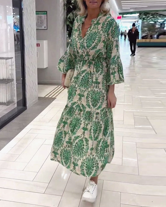 Jurk met trekkoord en klokmouwen met print