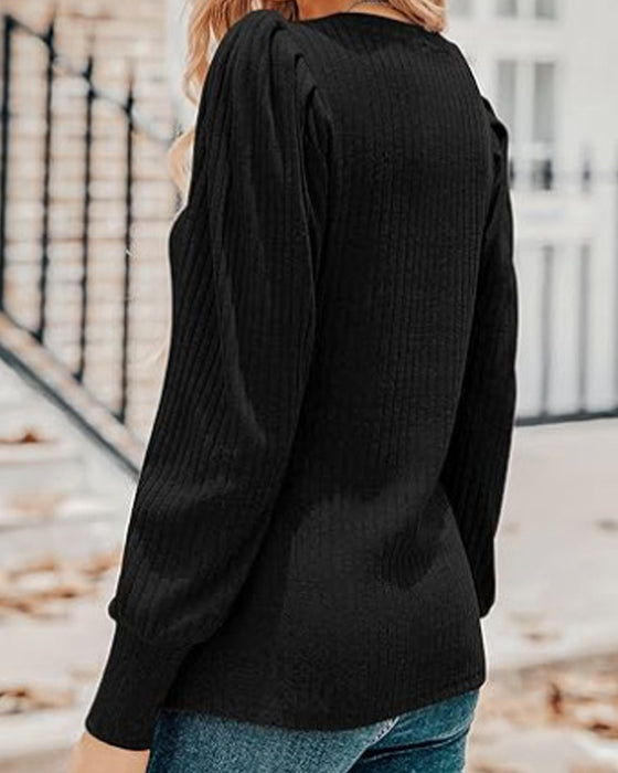 Effen top met lange mouwen en V-hals