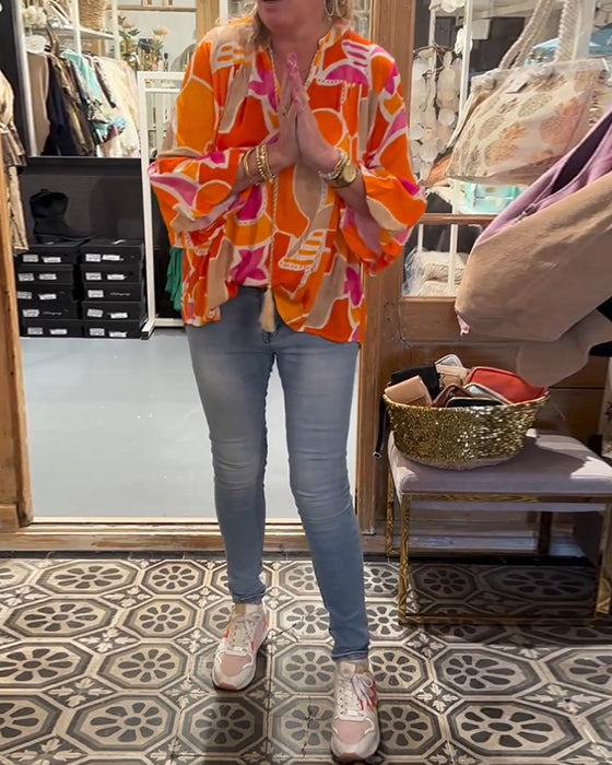 Blouse met kleurrijke en vallende schouders