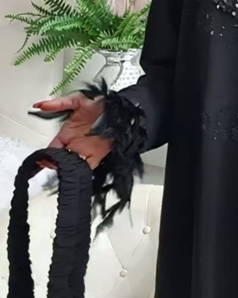 Modieuze Wijde Jurk Met Pailletten En Patchworkdetails