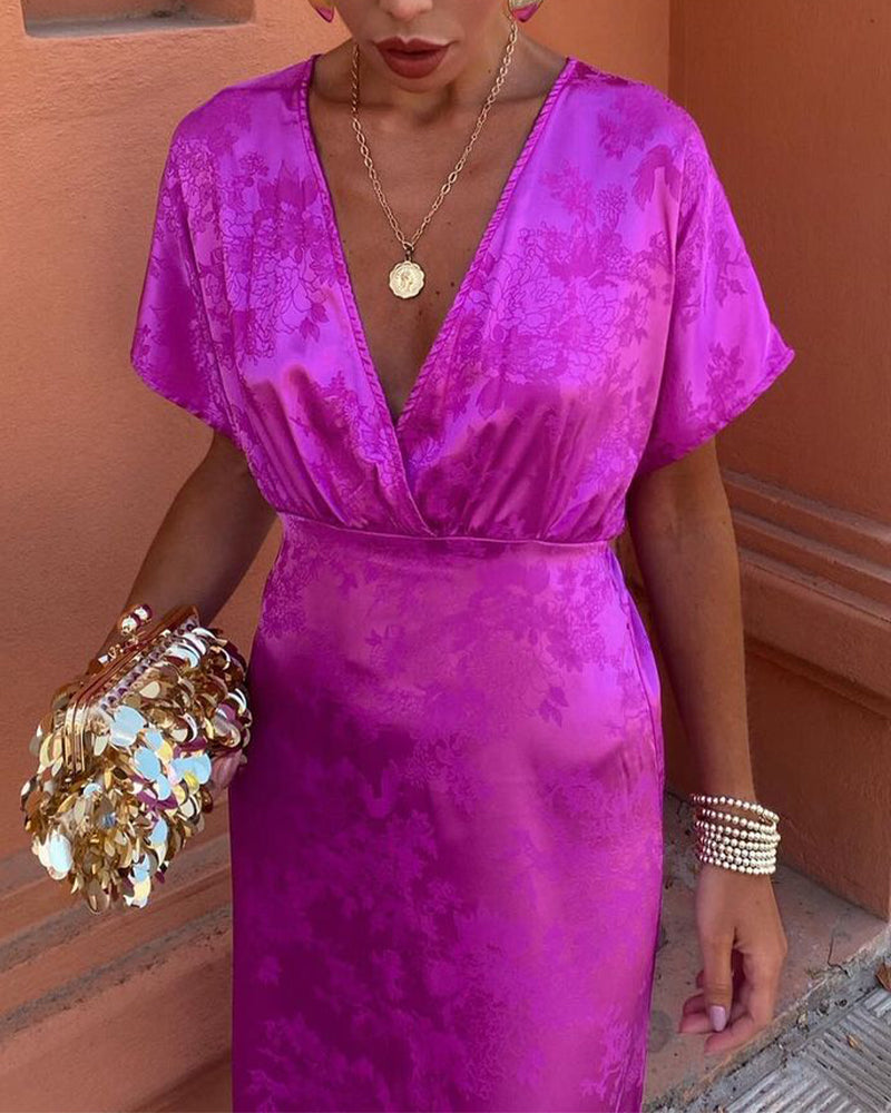 Elegante jurk met diepe V-taille, effen kleur