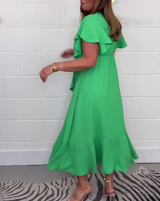 Elegante jurk met ruches, effen kleur en split