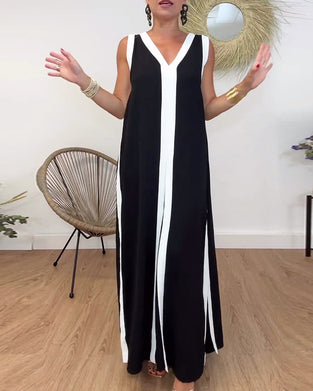 Modieuze mouwloze jurk met V-hals en contrasterende print