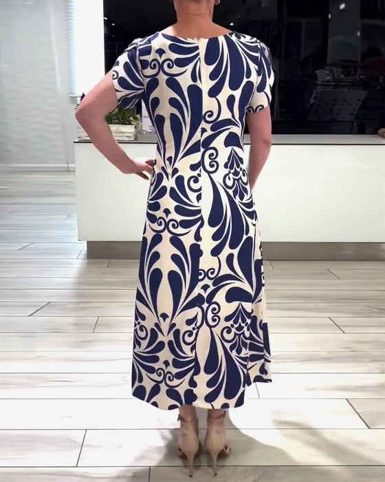 Elegante jurk met korte mouwen en contrastprint