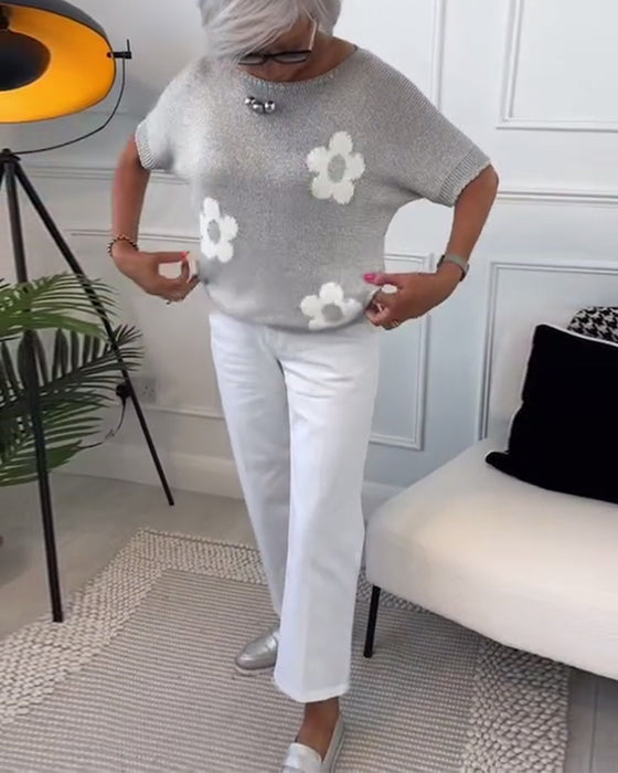 Smalle trui met ronde hals en bloemenprint