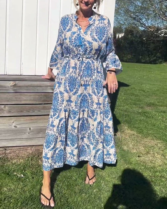 Jurk met trekkoord en klokmouwen met print