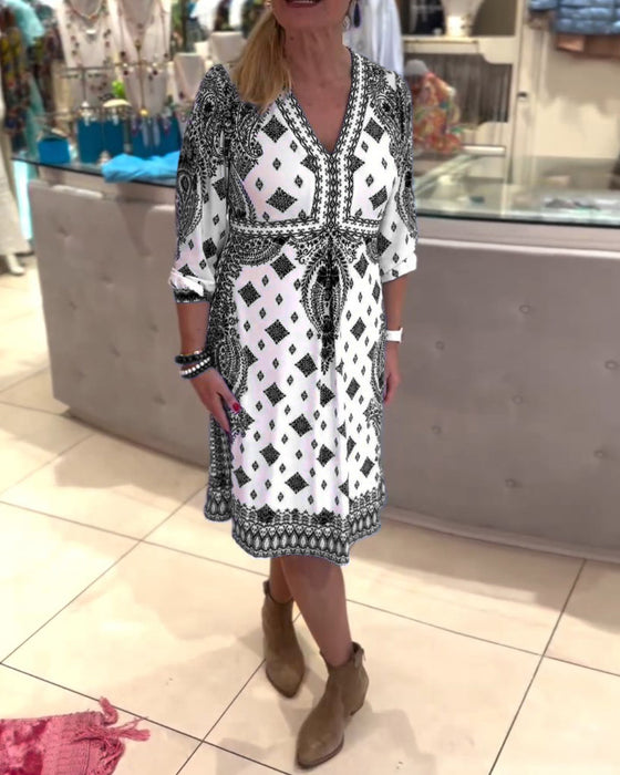 Elegante midi-jurk met V-hals