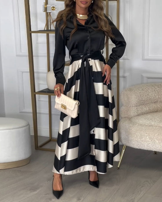 Elegante gestreepte bedrukte jurk met revers en band