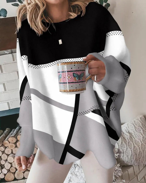 Nonchalante top met lange mouwen in contrasterende kleuren