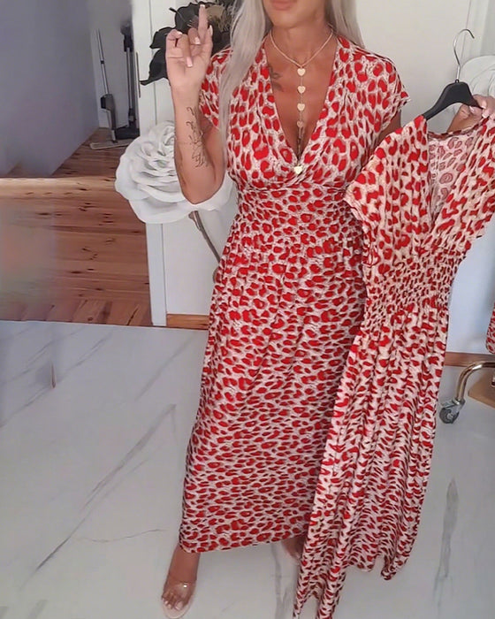 Elegante jurk met luipaardprint en v-hals