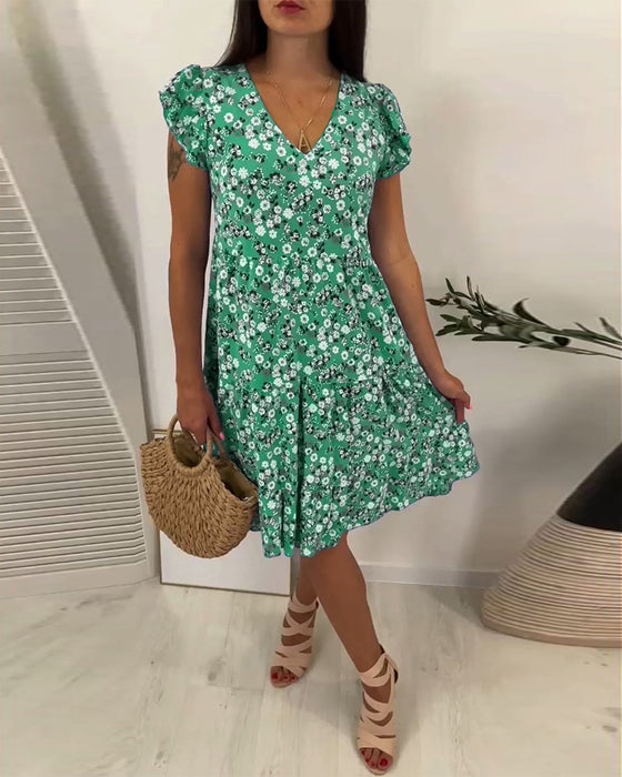 Mouwloze midi-jurk met V-hals en bloemenprint