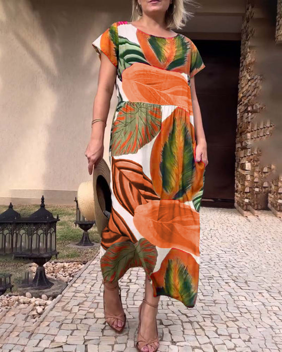 Jurk met split en korte mouwen met bladprint
