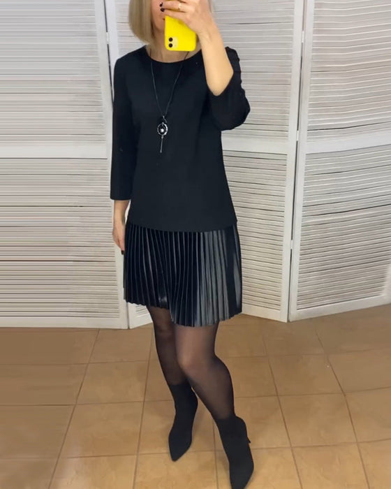 Jurk met geplooide panelen en effen kleuren