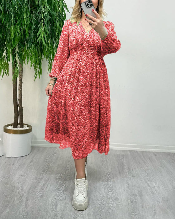 Elegante jurk met knopen en print