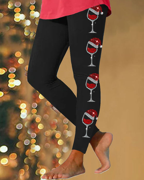 Vrolijke kerst legging met glanzende wijnglasprint voor dames