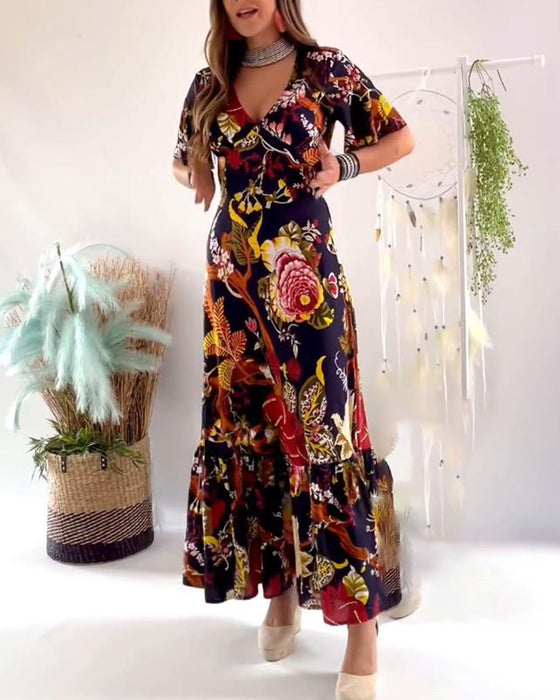 Elegante jurk met V-hals en korte mouwen met print