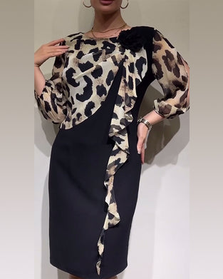 Elegante patchworkjurk met luipaardprint