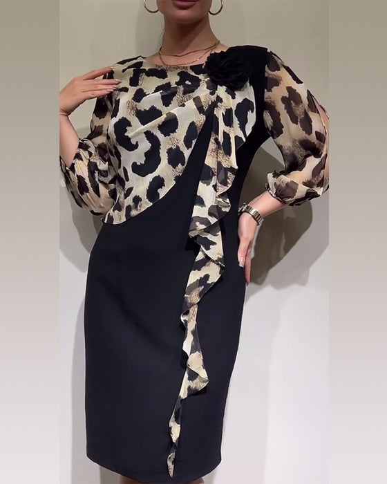 Elegante patchworkjurk met luipaardprint