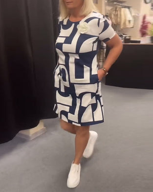 Jurk met ronde hals en zak met geometrische print