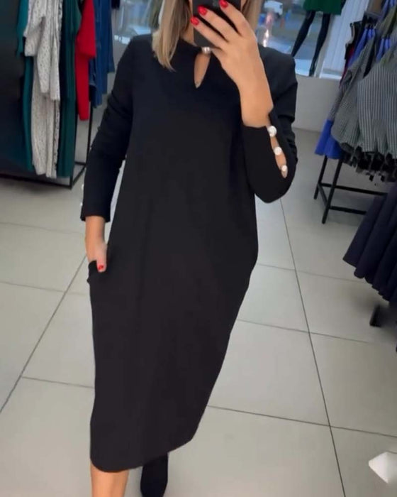 Elegante jurk met parelknopen