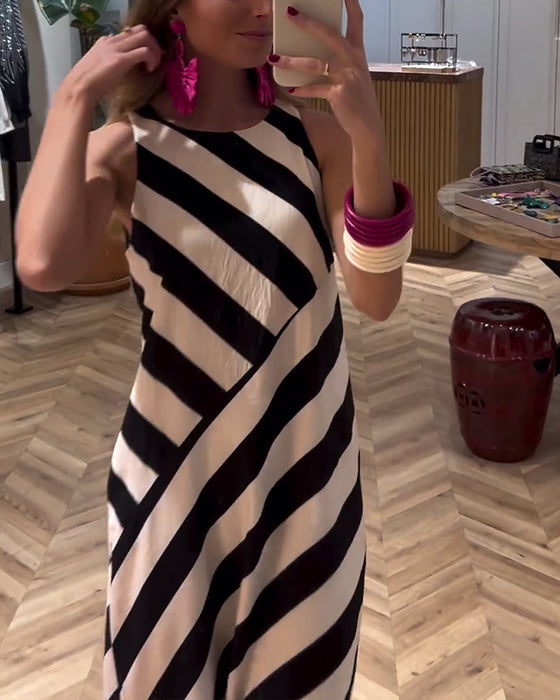 Mouwloze jurk met split en contrasterende strepenprint