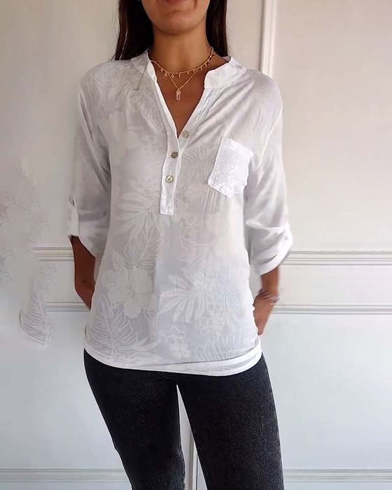 Top met bladprint en patchwork-pailletten