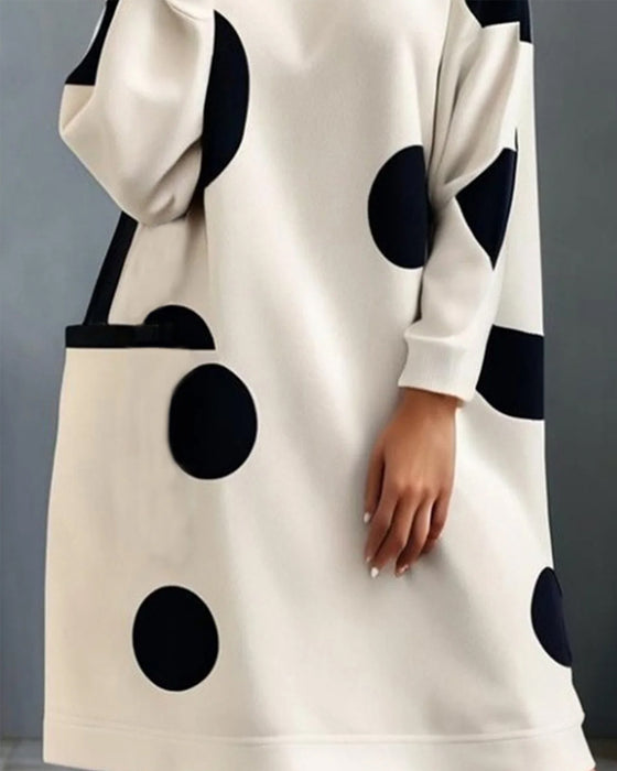 Elegante polkadot losse jurk met hoge hals zak
