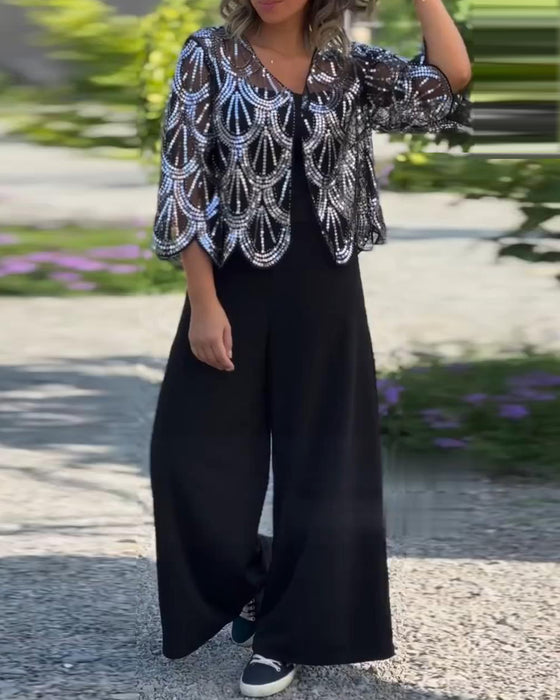 Elegante jas met lovertjes en golvende rand