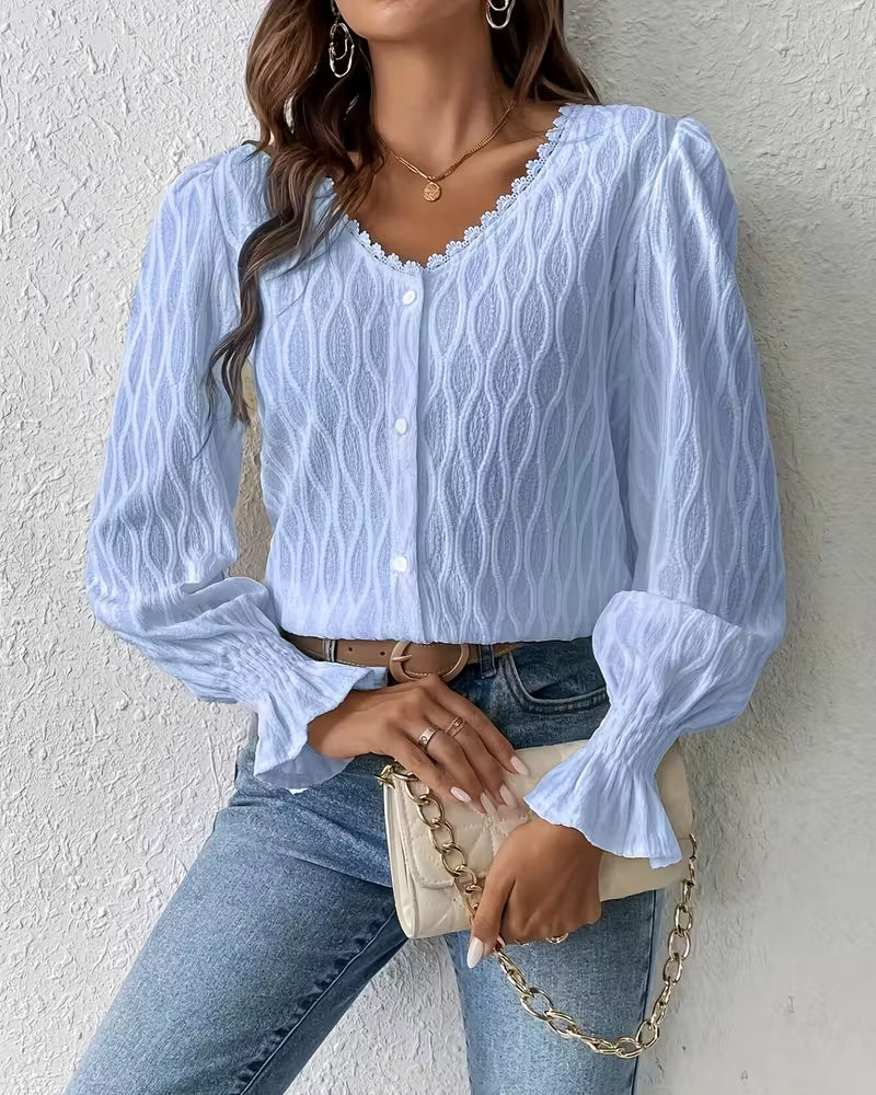 Elegante blouse met jacquard en ruchesmouw