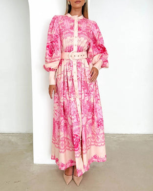 Jurk met knoopjesprint en lantaarnmouwen