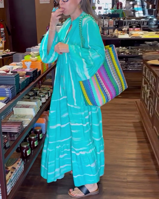 Casual losse lange jurk met V-hals en uitlopende mouwen