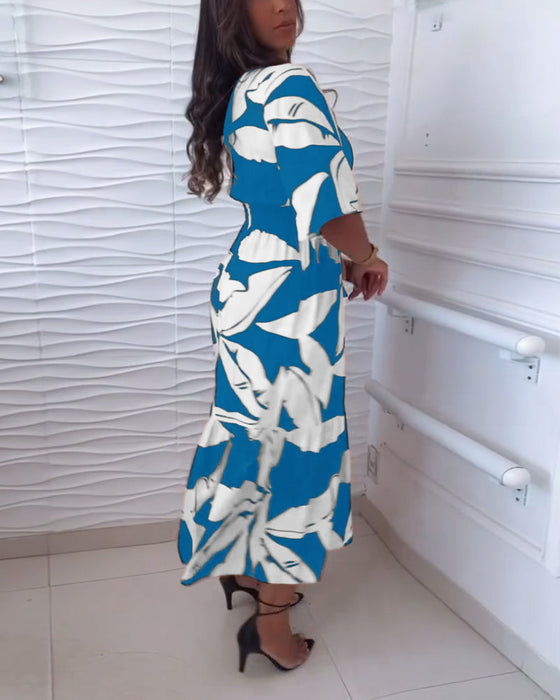 Elegante jurk met V-hals, driekwart mouw en trekkoord