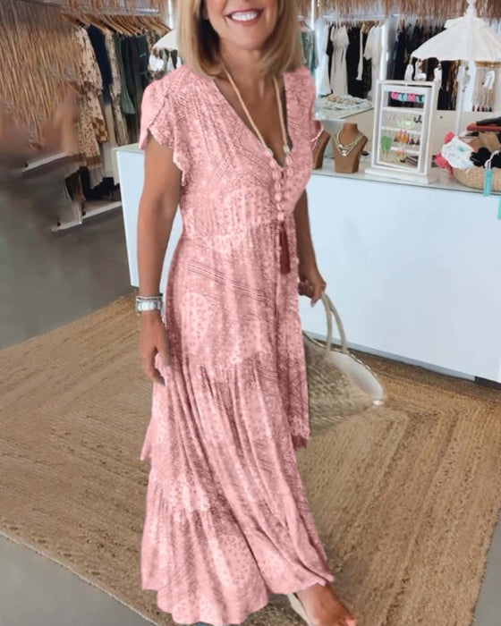 Jurk met V-hals en splitmouwen met vakantieprint