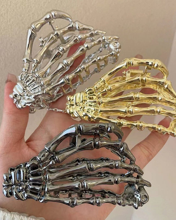 Haarclip met skeletklauw