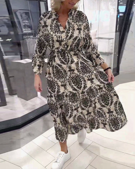 Jurk met trekkoord en klokmouwen met print