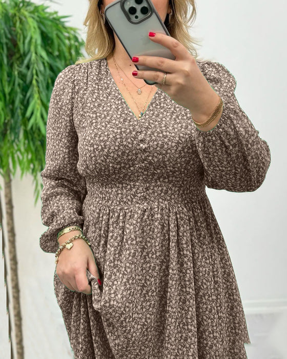 Elegante jurk met knopen en print