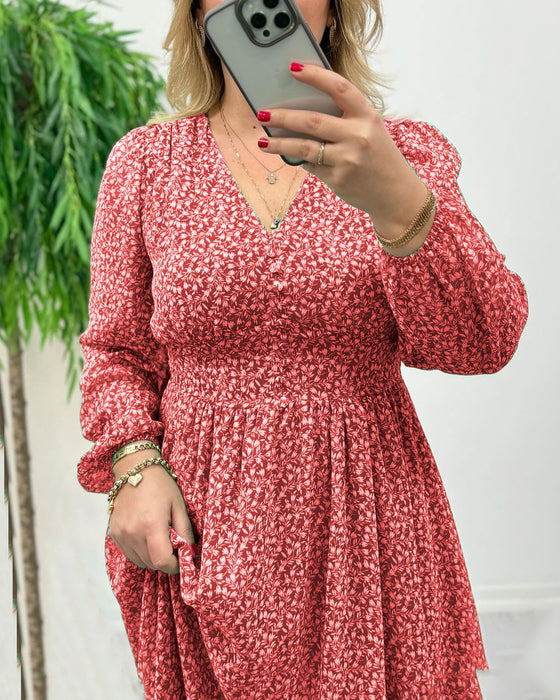 Elegante jurk met knopen en print