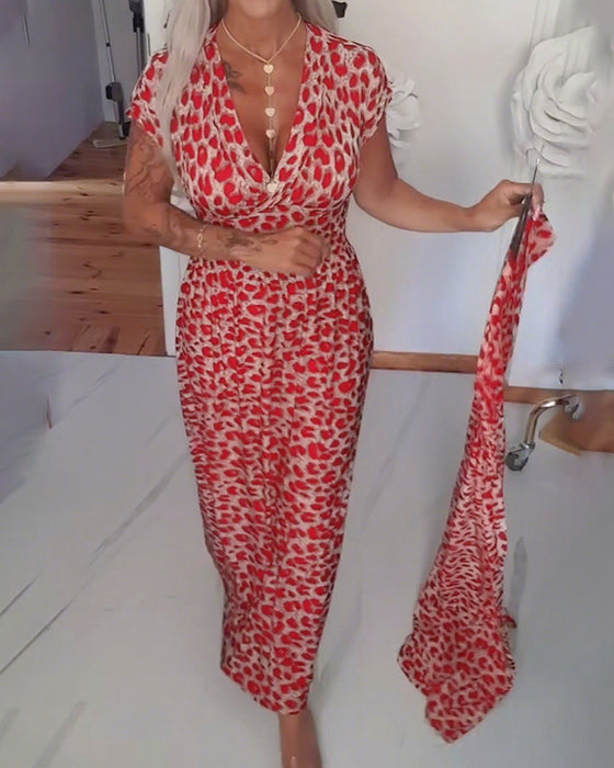 Elegante jurk met luipaardprint en v-hals