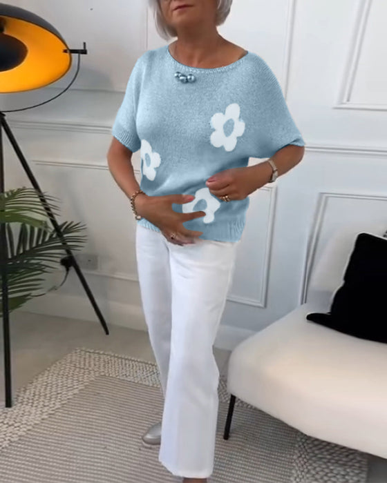 Smalle trui met ronde hals en bloemenprint