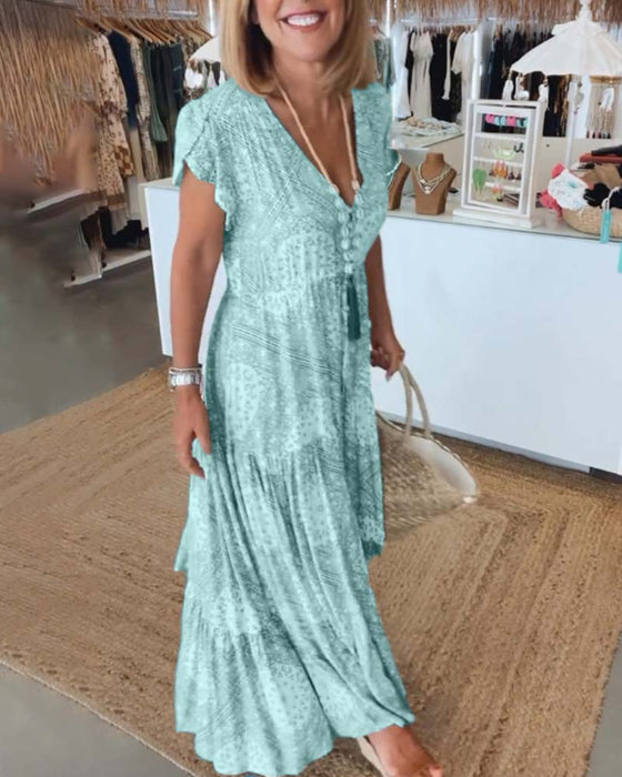 Jurk met V-hals en splitmouwen met vakantieprint