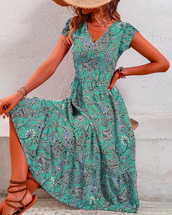 Jurk met korte mouwen en gebloemde V-hals