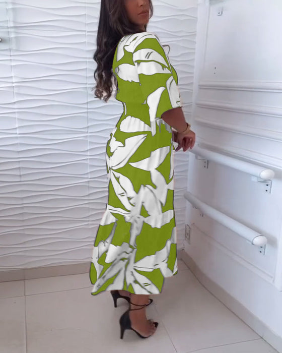 Elegante jurk met V-hals, driekwart mouw en trekkoord